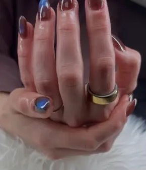 Showanda's recent work: plum and blue cat-eye nails